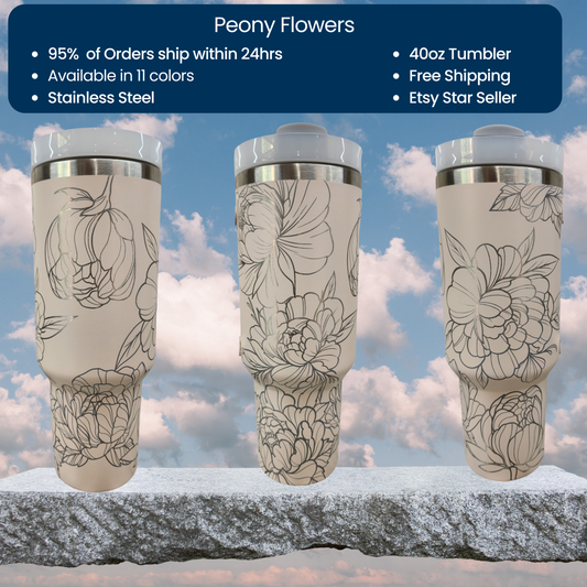 a set of three tumblers sitting on top of a rock