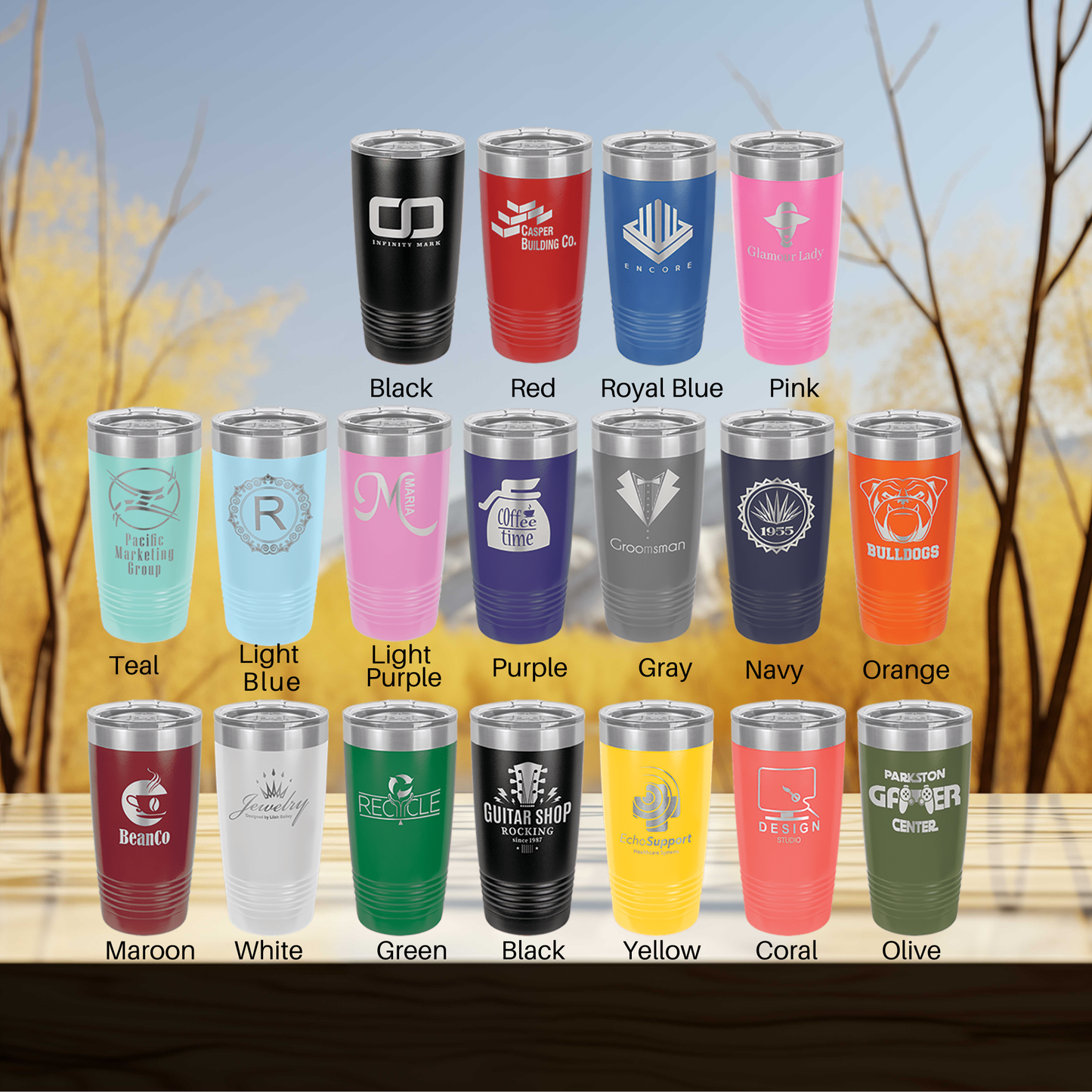 a group of different colored cups sitting on top of a table