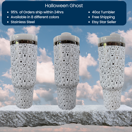 three tall white vases sitting on top of a stone wall