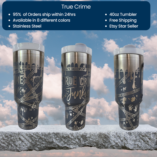 three travel mugs sitting on top of a rock