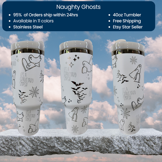 a couple of cups sitting on top of a stone wall