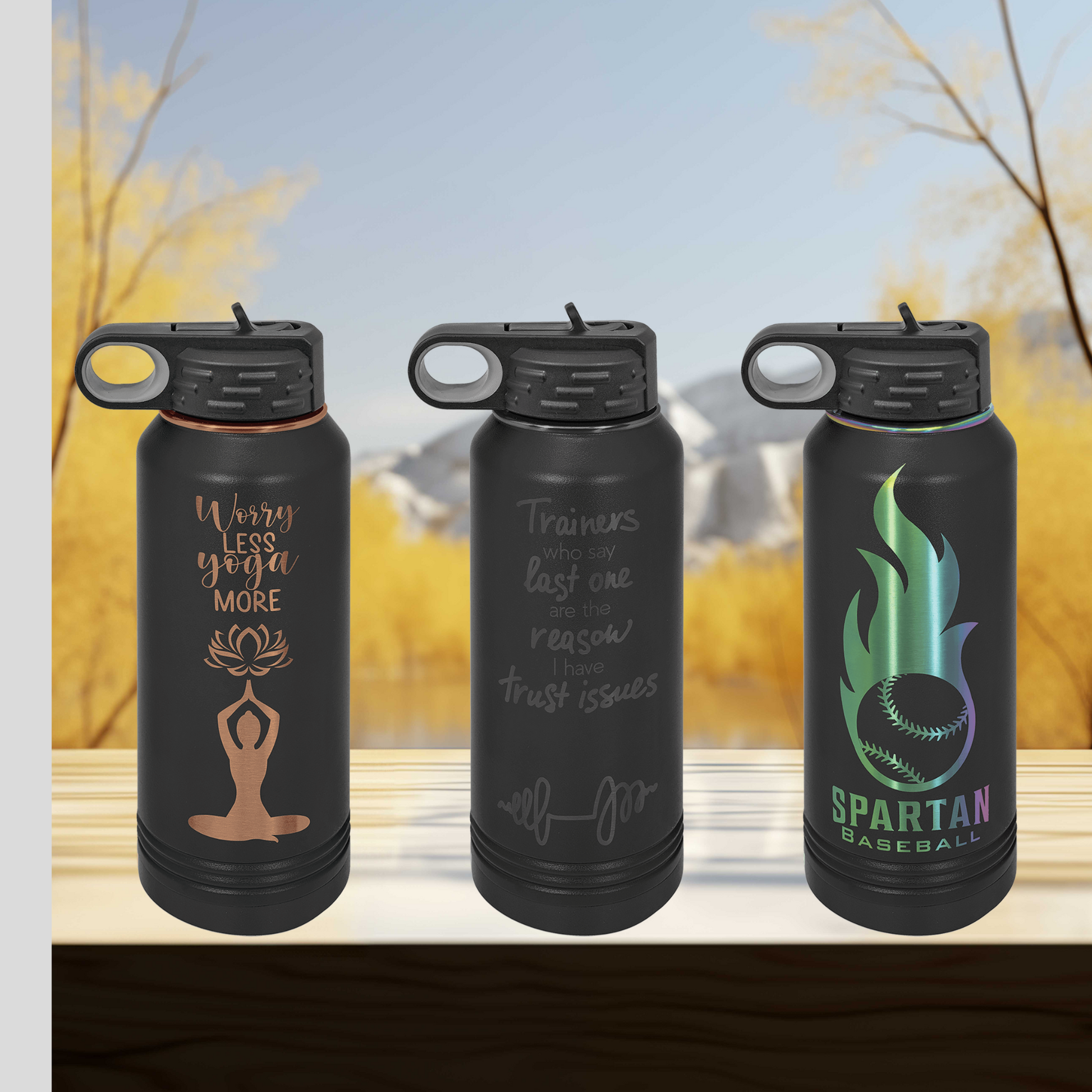 three different styles of water bottles on a table