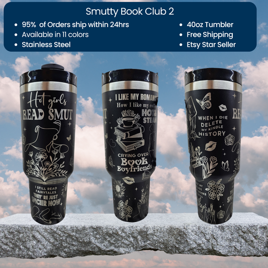three travel mugs with writing on them sitting on a rock