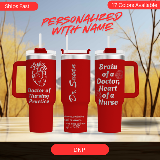 three red travel mugs sitting on top of a table