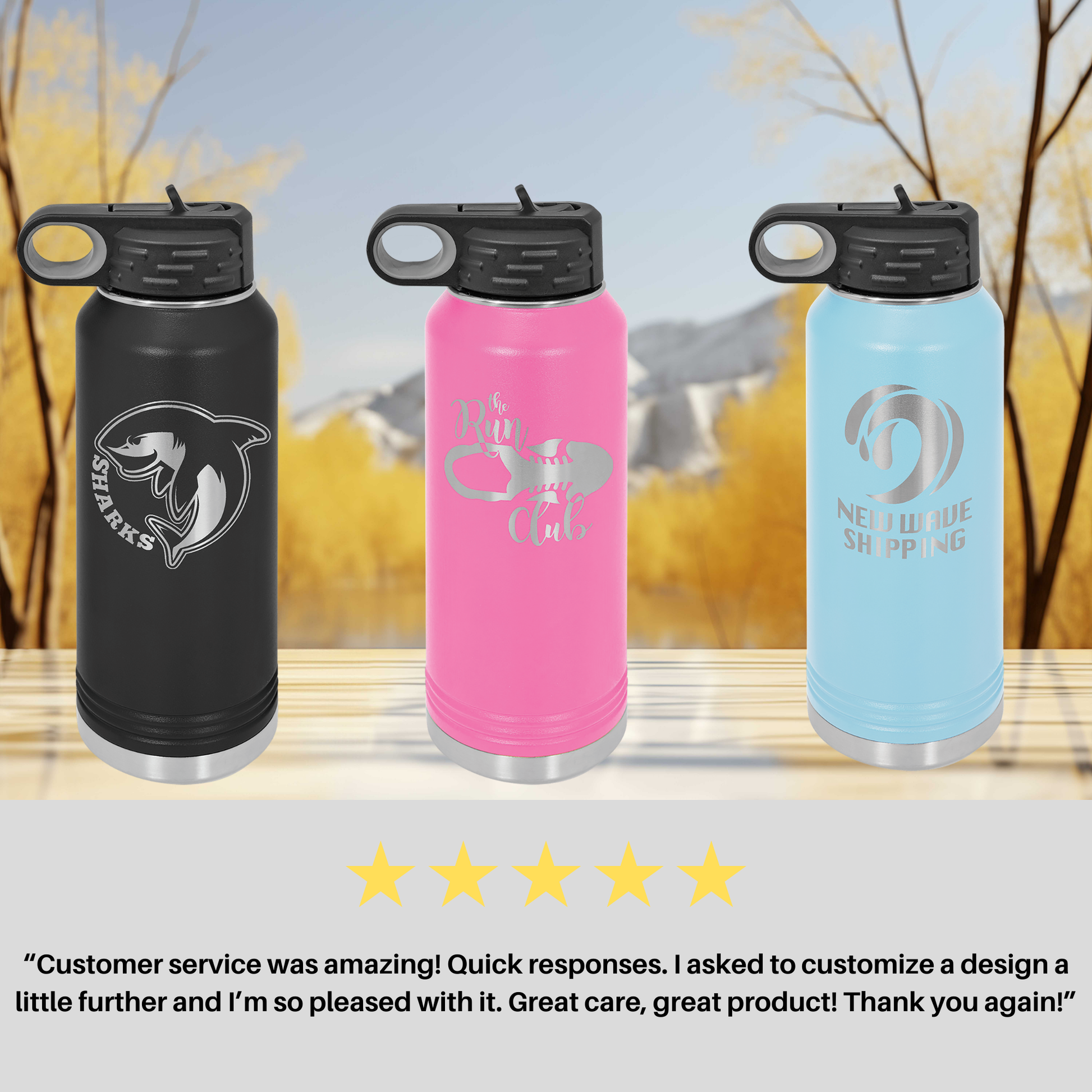 three different colored water bottles sitting on top of a table