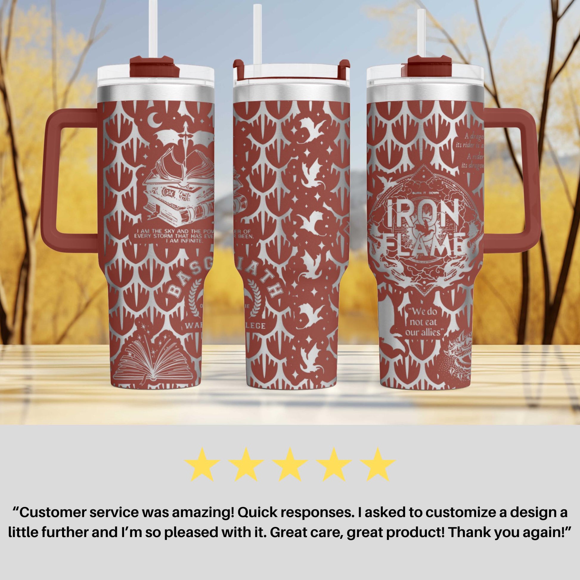 three red travel mugs sitting on top of a table