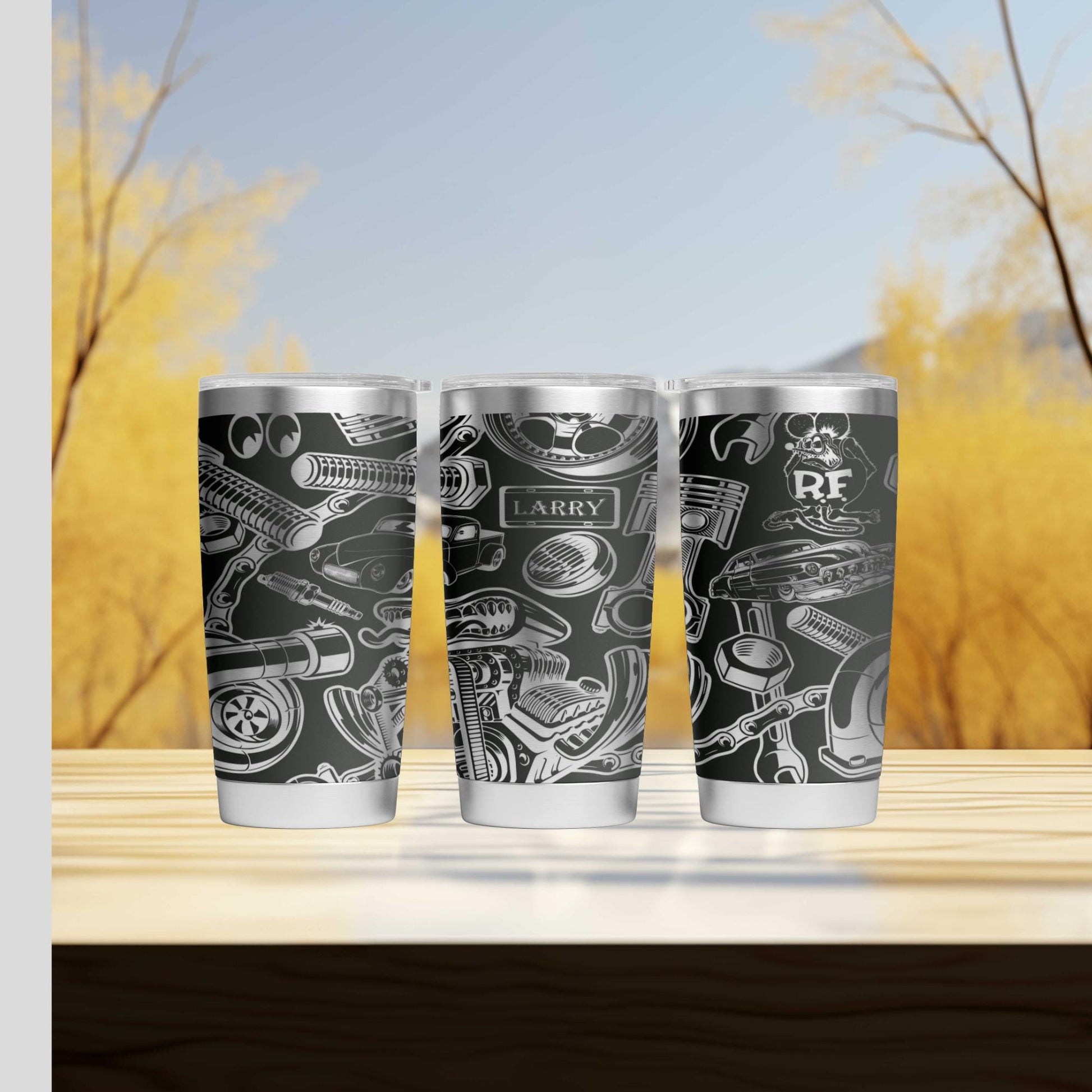 three cups sitting on top of a wooden table