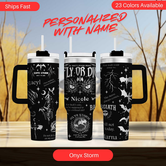 a set of three travel mugs sitting on top of a table