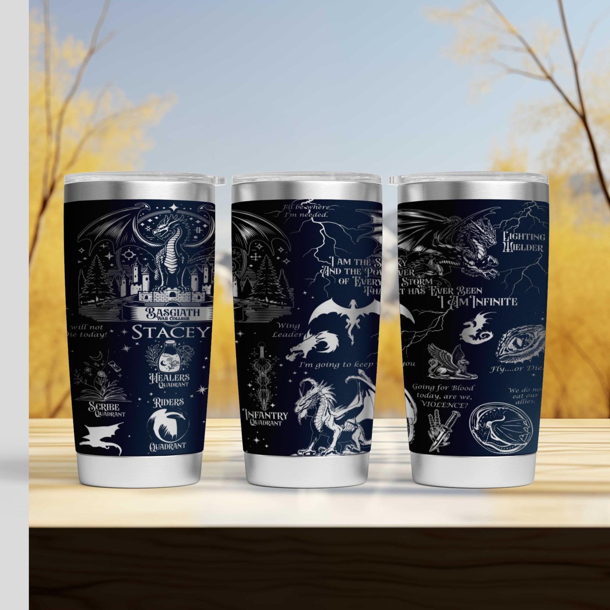 a set of three harry potter tumblers sitting on top of a wooden table