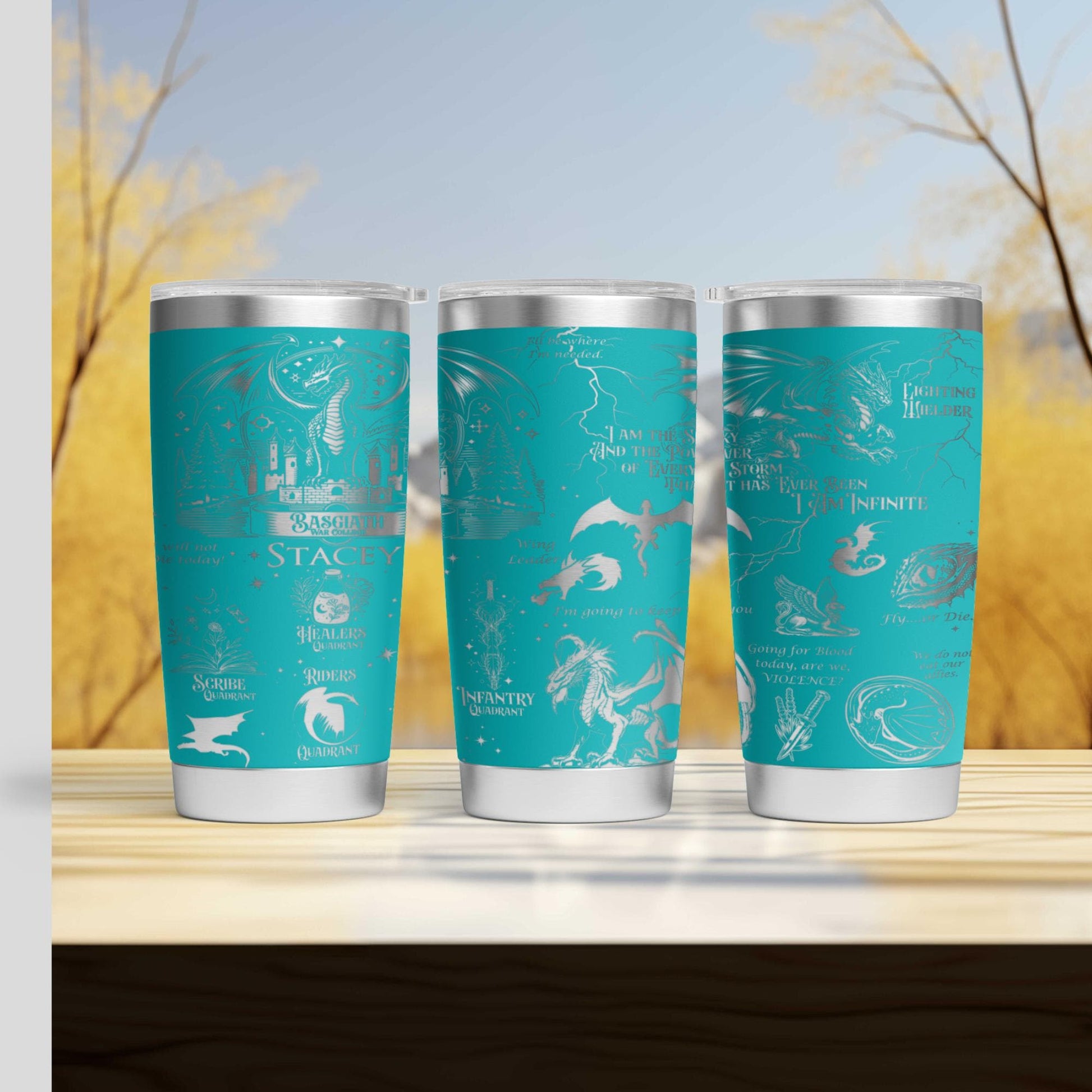 a set of three cups sitting on top of a wooden table