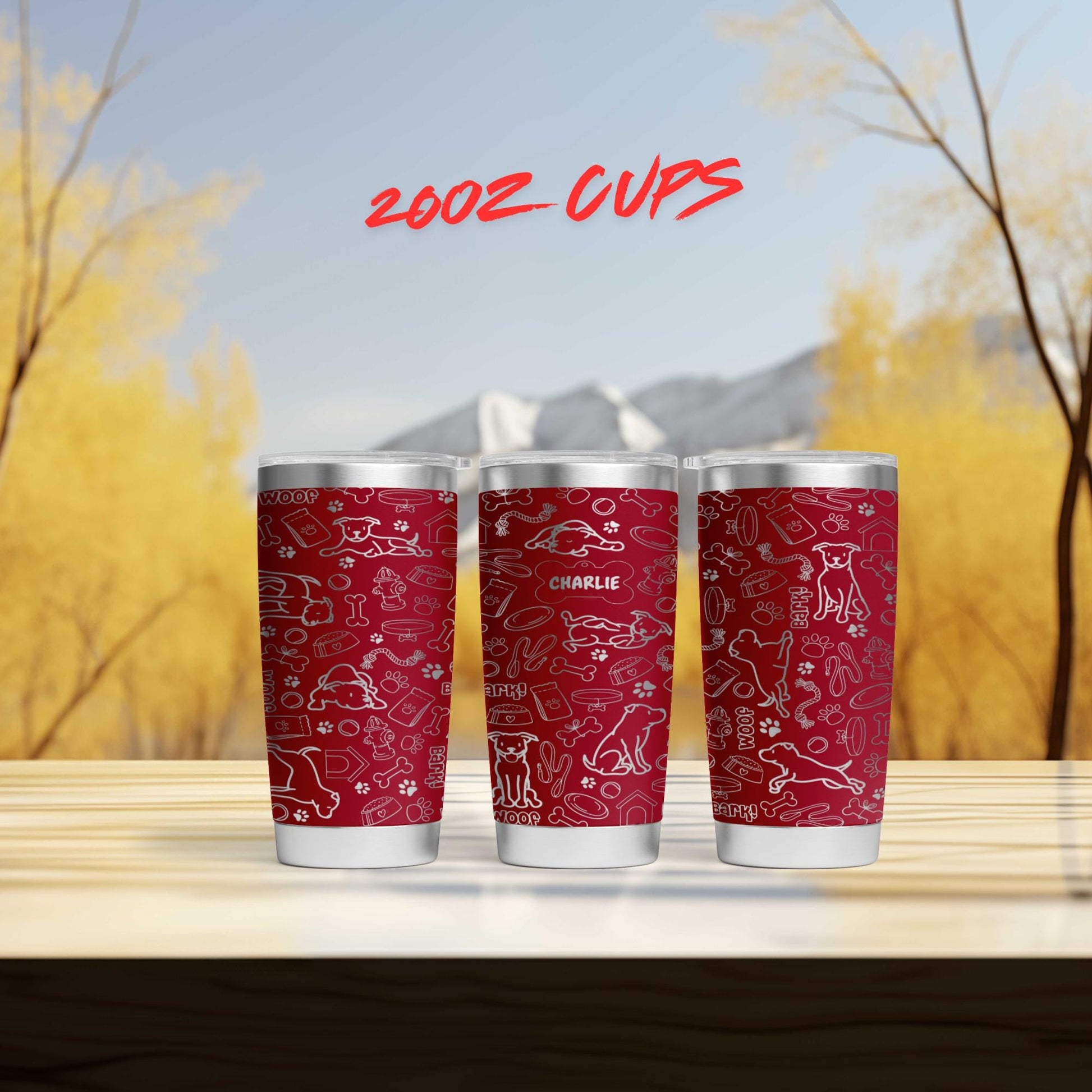 three red cups sitting on top of a wooden table