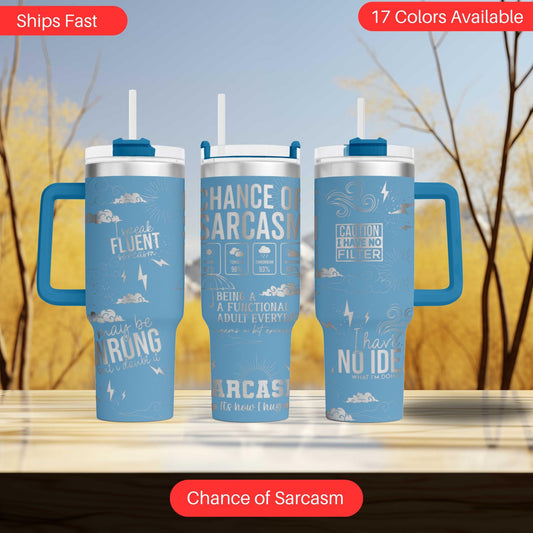 three travel mugs sitting on top of a table