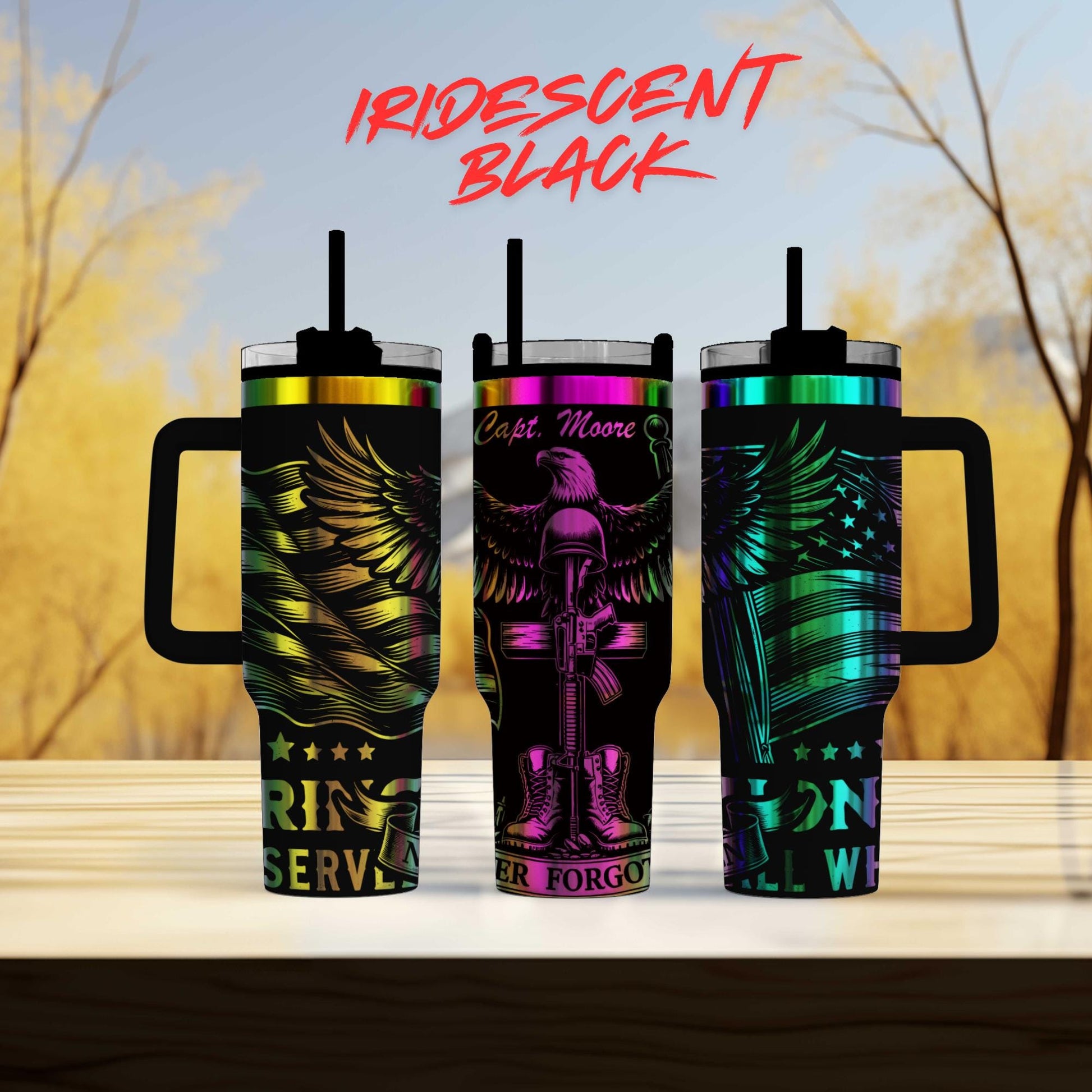 three different colored tumblers sitting on top of a table