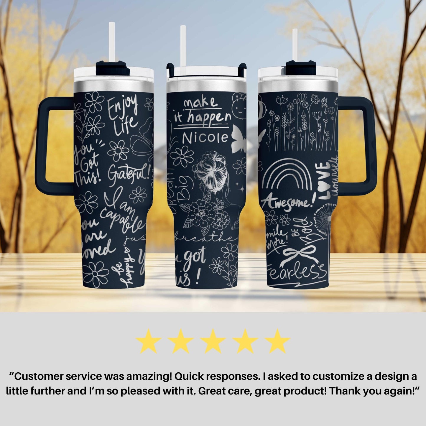 a set of three travel mugs sitting on top of a table