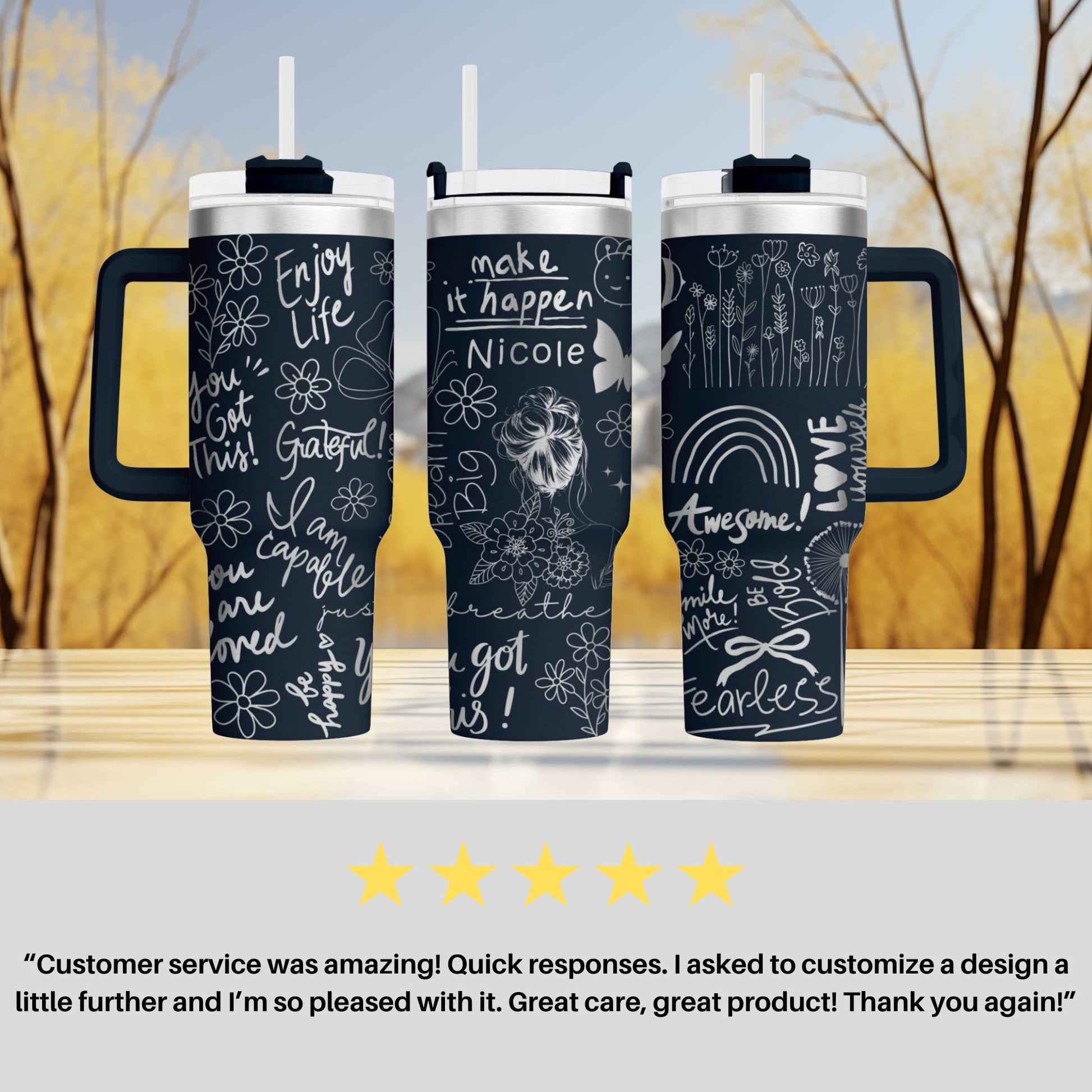 a set of three travel mugs sitting on top of a table