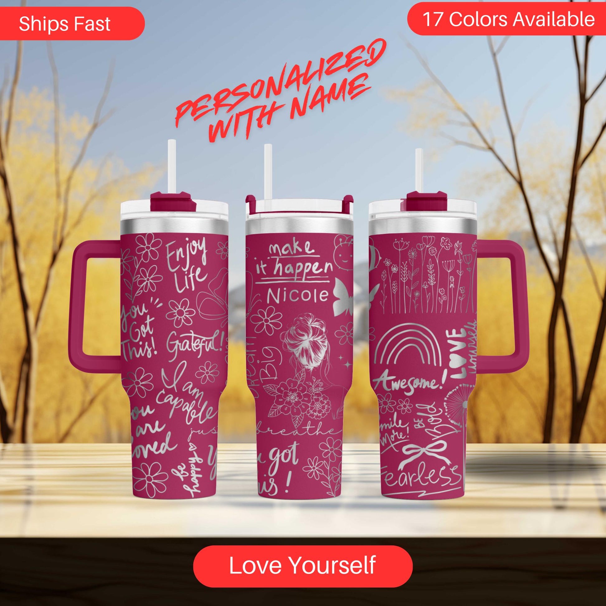 a couple of pink coffee mugs sitting on top of a table