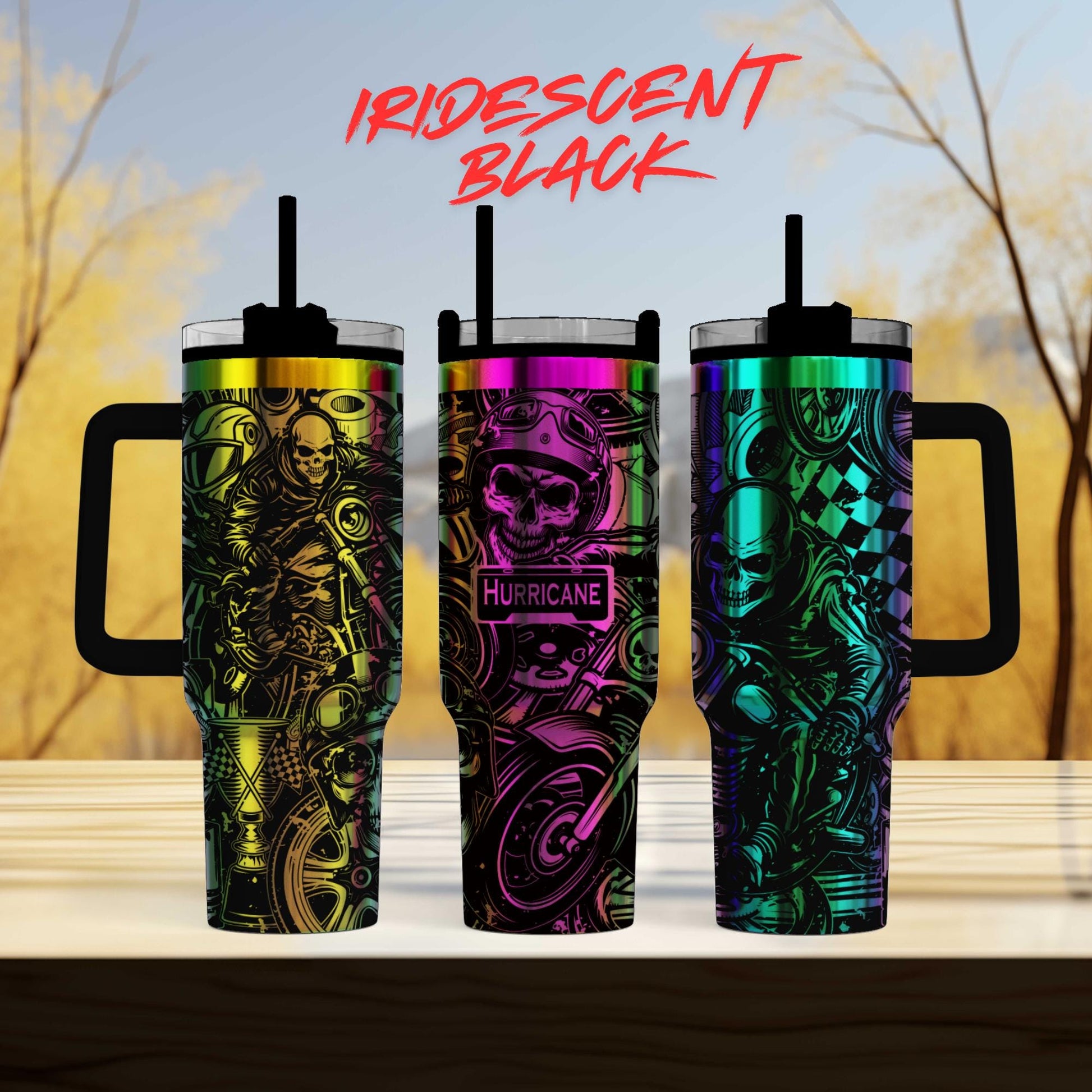 three different colored tumblers sitting on top of a table