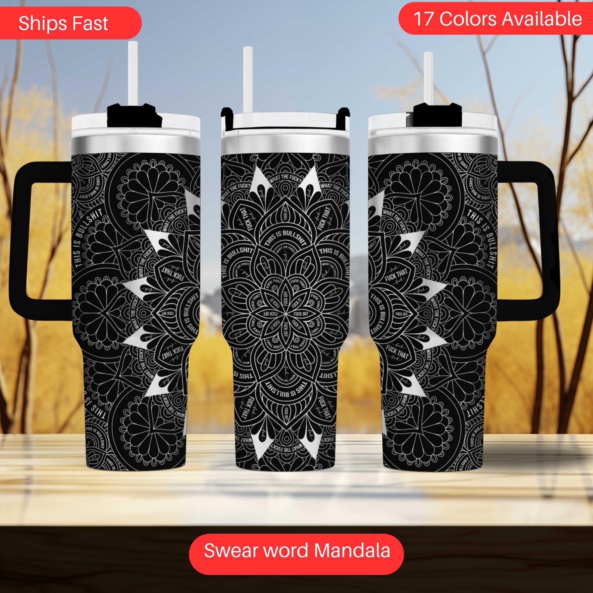 a set of three travel mugs sitting on top of a table