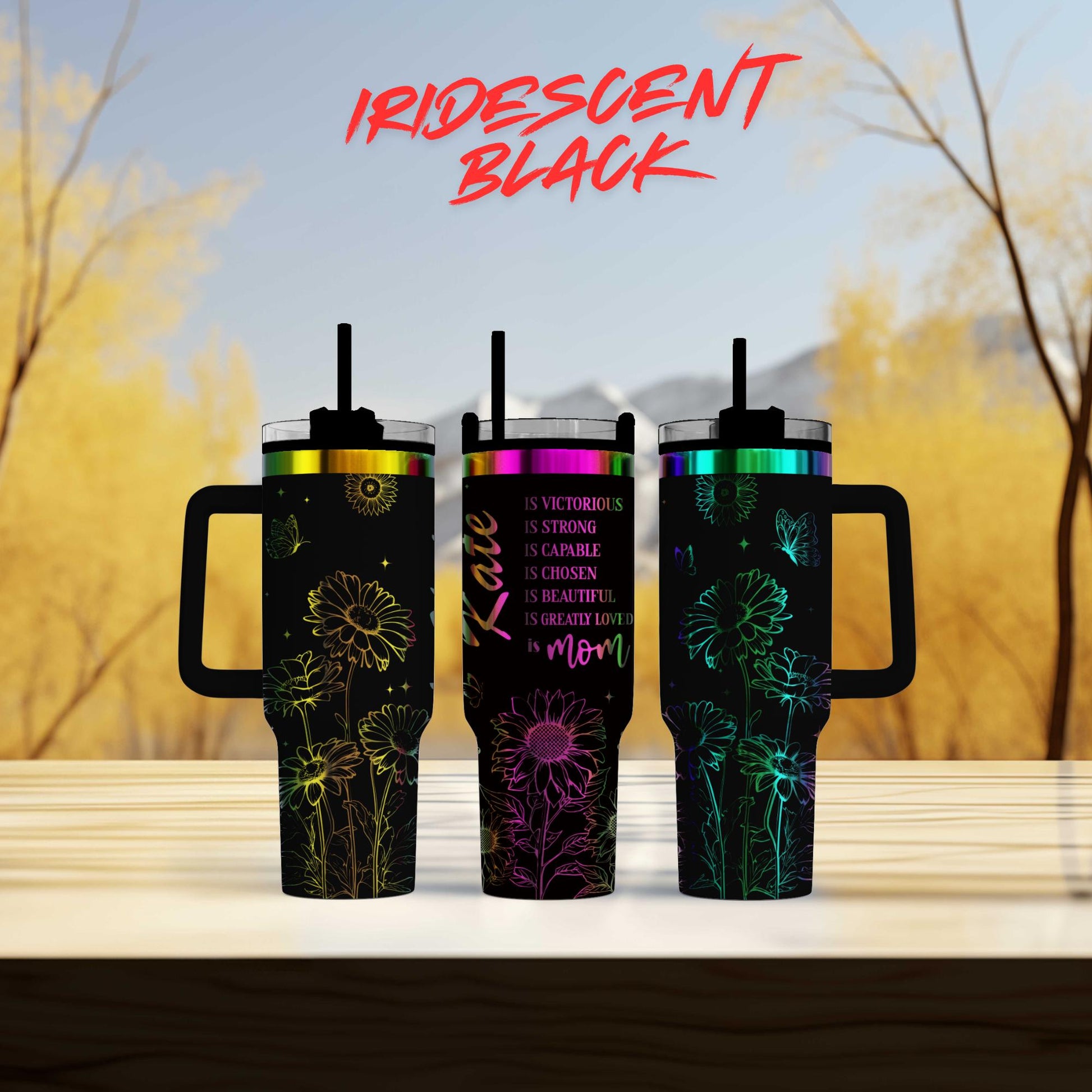 three tumblers sitting on top of a wooden table