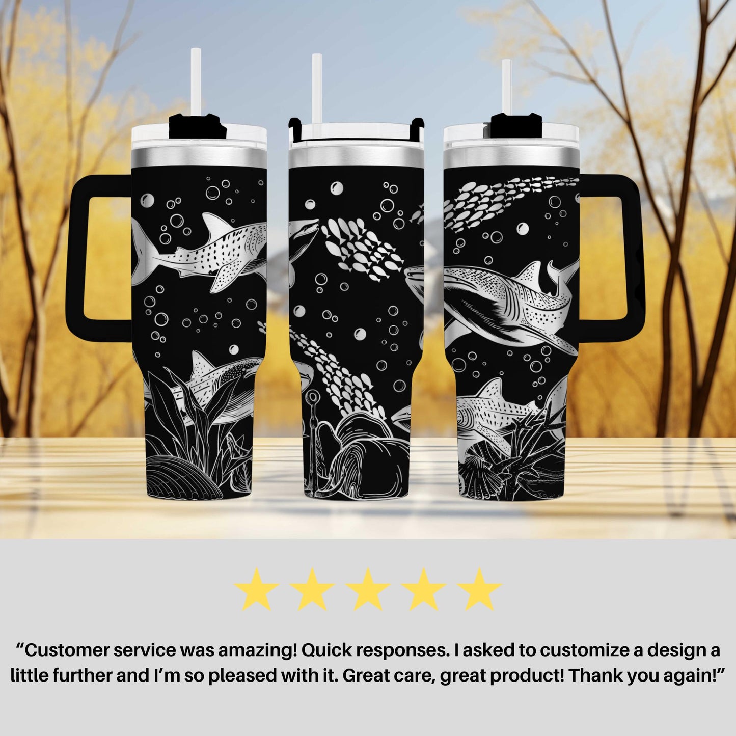 a couple of black and white cups sitting on top of a table