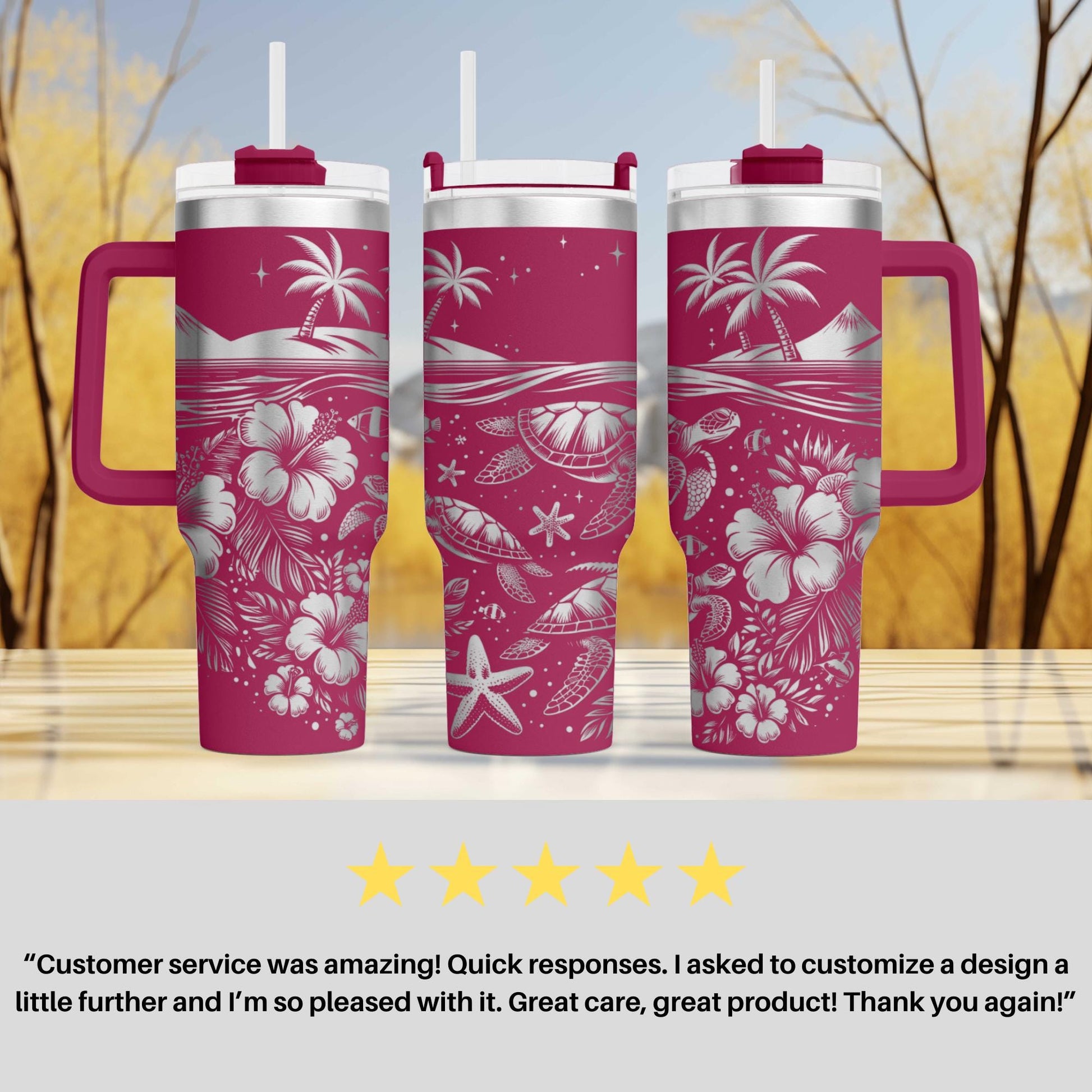 three pink travel mugs sitting on top of a table