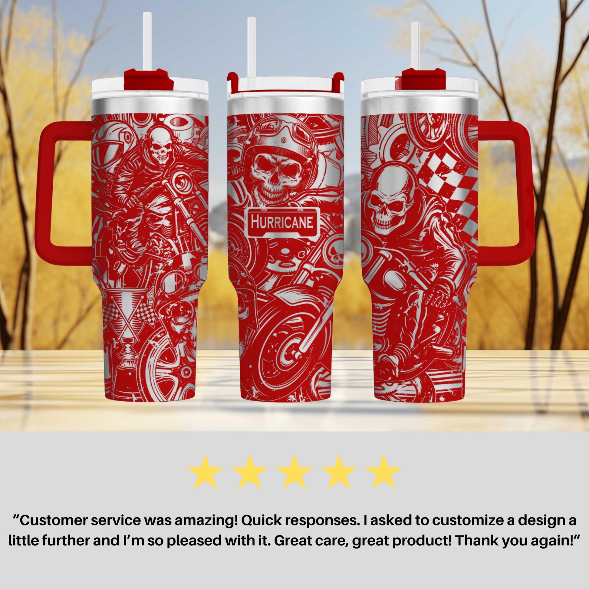 three red travel mugs sitting on top of a table