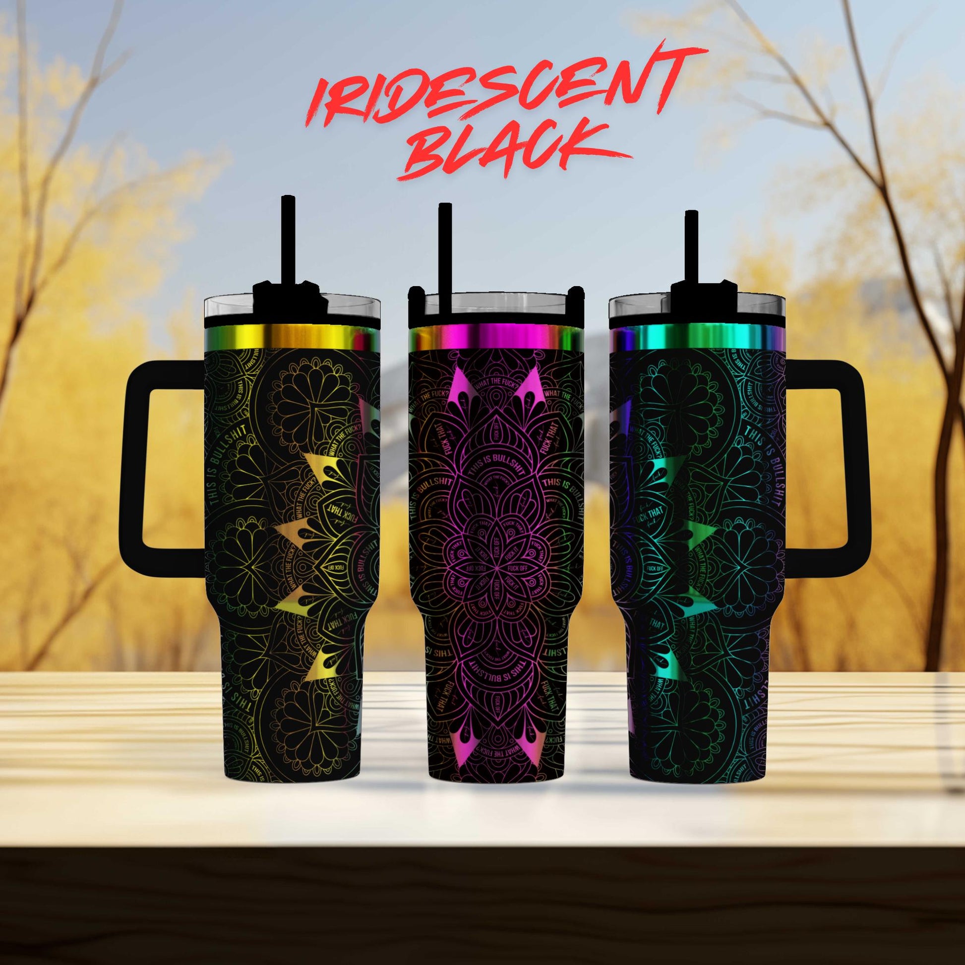 three colorful tumblers sitting next to each other on a table