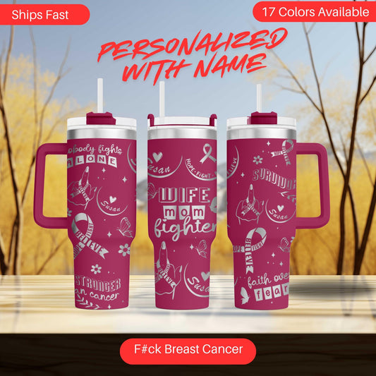 three pink travel mugs sitting on top of a table