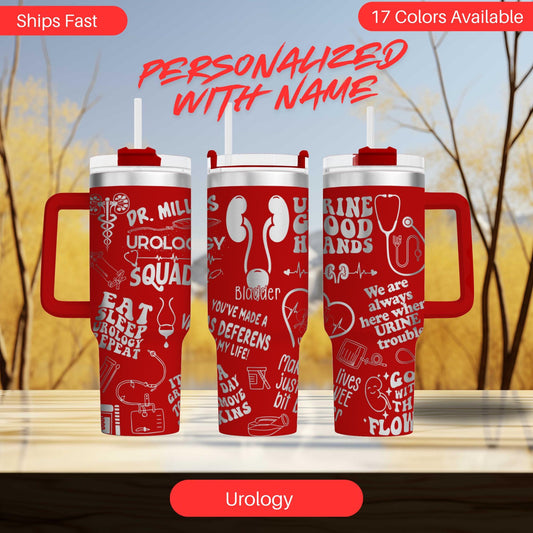 three red travel mugs sitting on top of a table