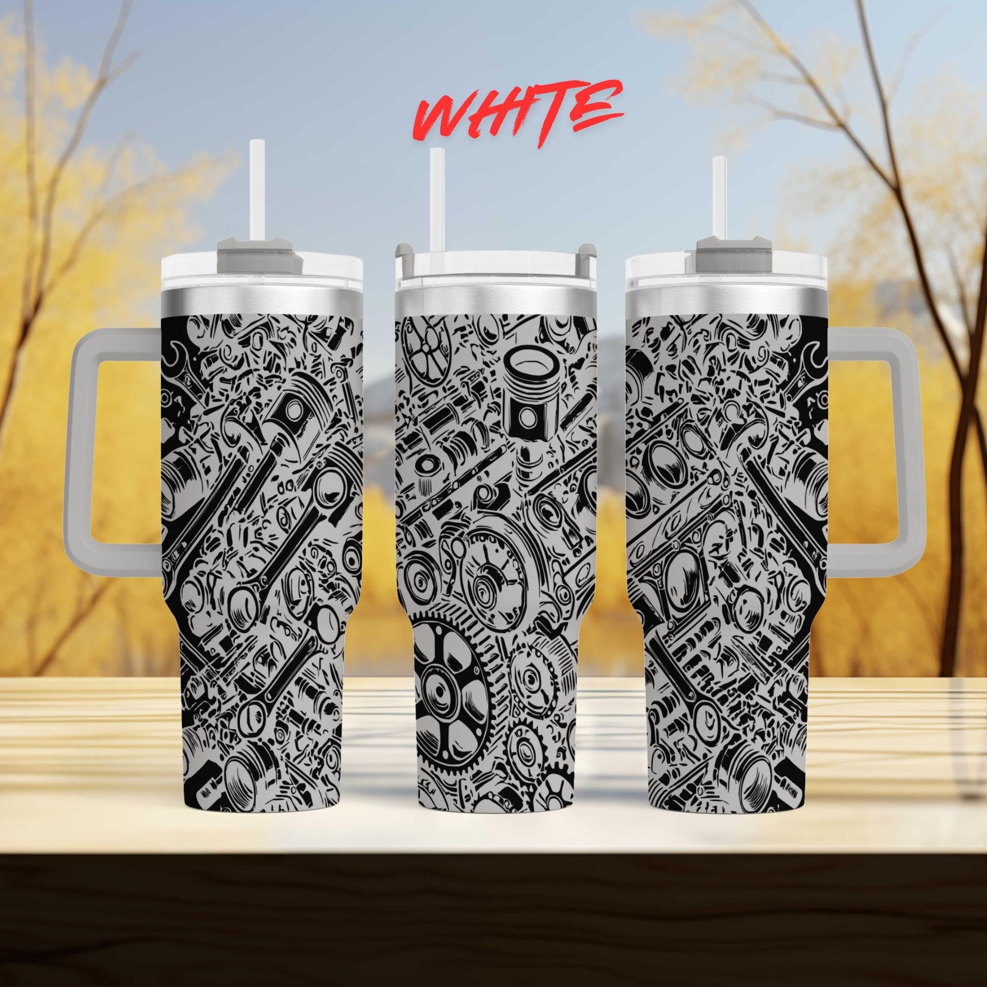 a couple of cups sitting on top of a wooden table