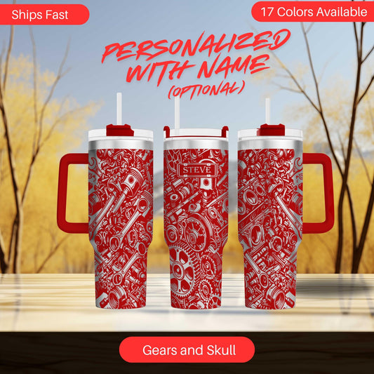 two red and white travel mugs sitting on top of a table