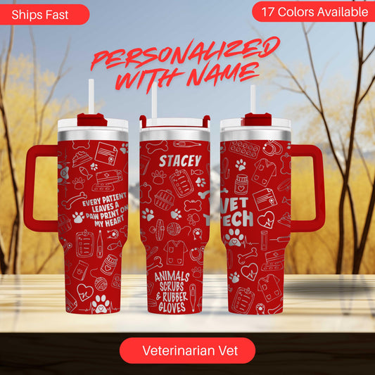 three red insulated tumblers with white text and illustrations related to veterinary care, such as paw prints, medical equipment, and animal care.