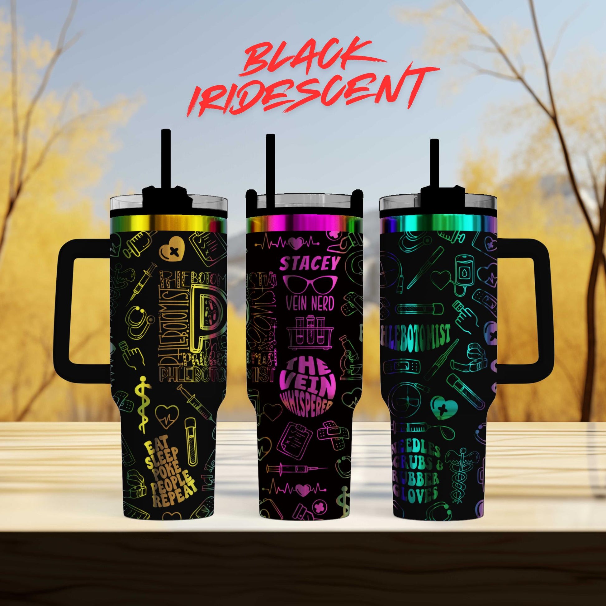 three colorful tumblers with various medical and nursing-themed designs on them, set against a blurred background of trees.