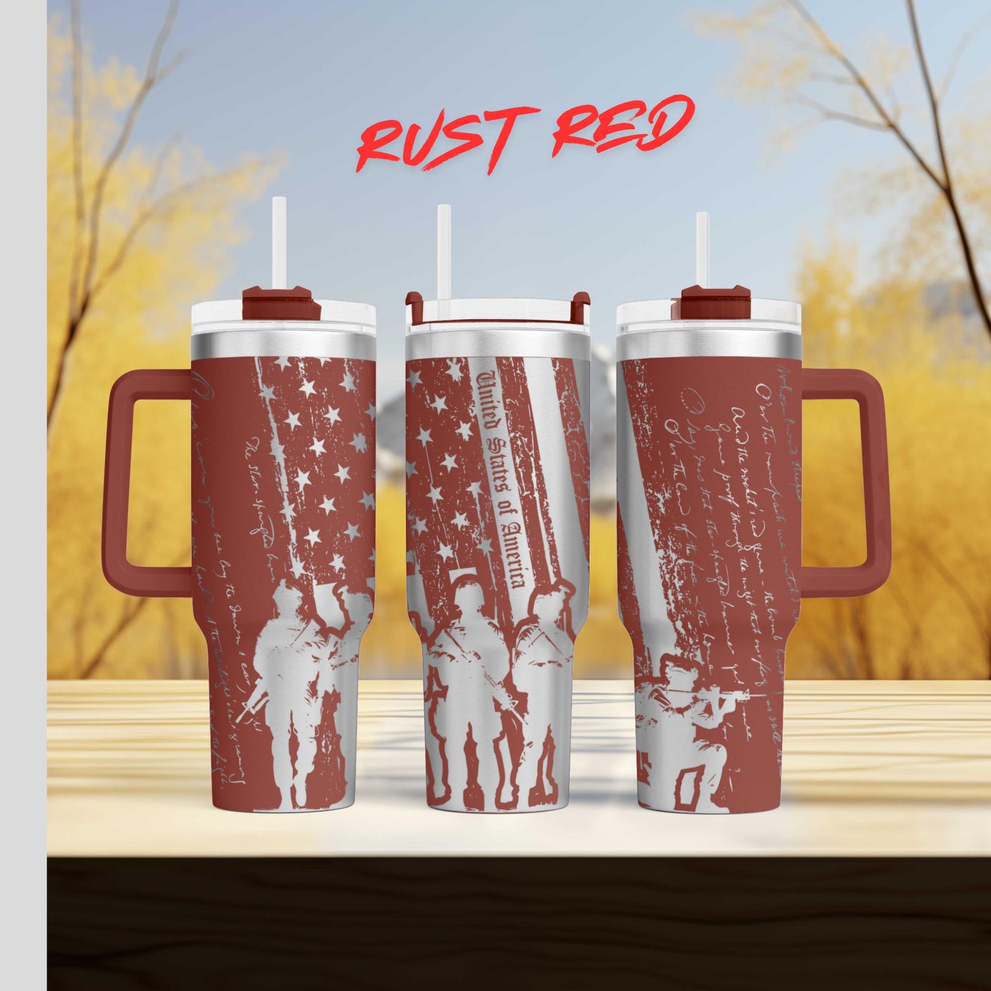 three red travel mugs sitting on top of a wooden table