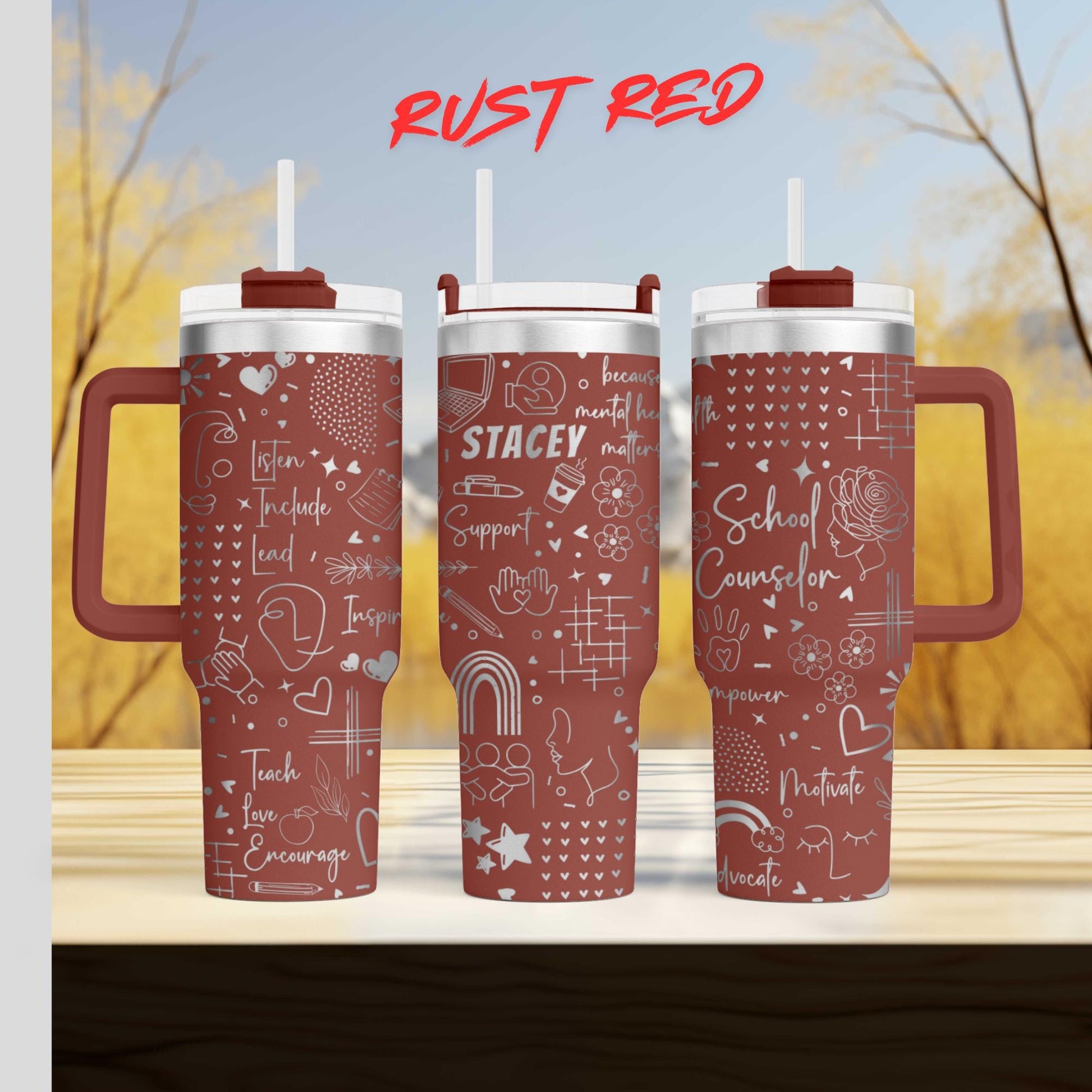 three red tumblers with various designs and text printed on them.