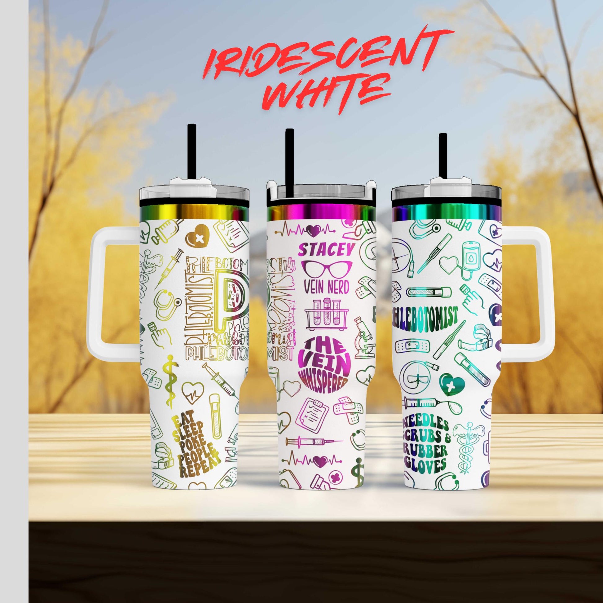 three colorful tumblers with various medical and healthcare-themed designs on them, placed on a wooden surface against a blurred background.