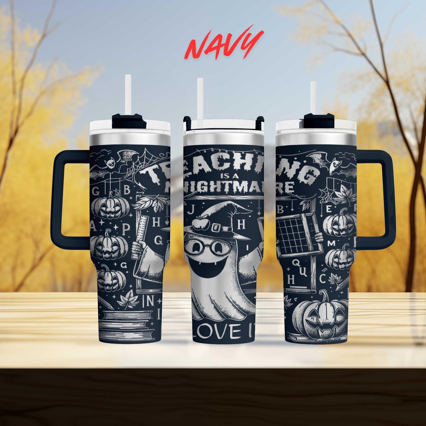 three black and white tumblers with Halloween-themed designs, including a ghost, pumpkins, and other spooky elements.