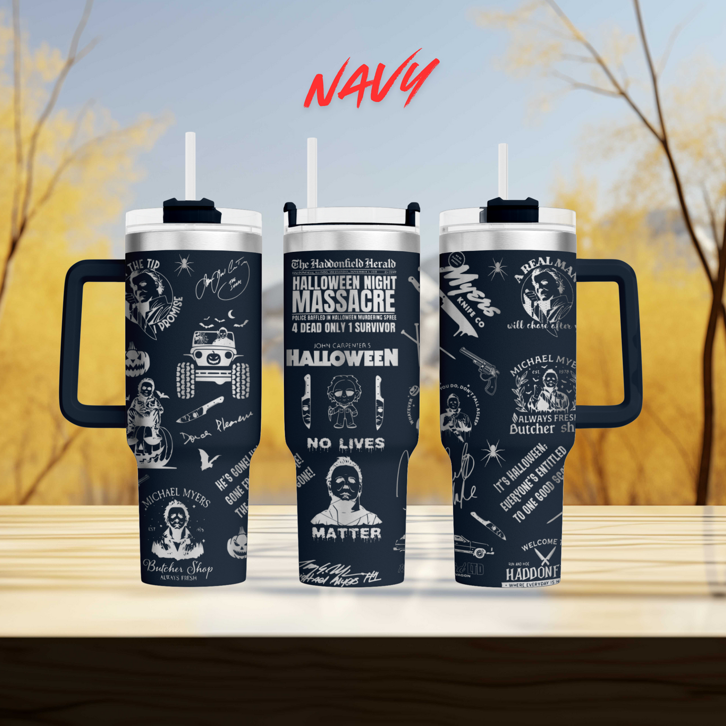 three travel mugs sitting on top of a wooden table