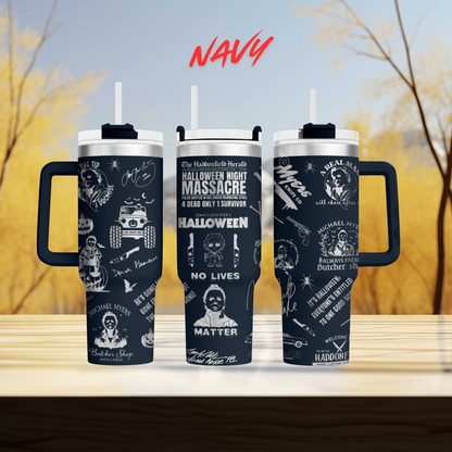 three travel mugs sitting on top of a wooden table