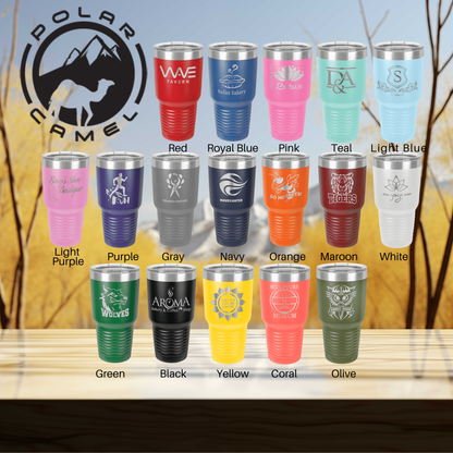 a group of different colored tumblers sitting on top of a table