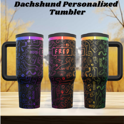 three colorful tumblers with personalized designs, including a dachshund and various dog-related items.