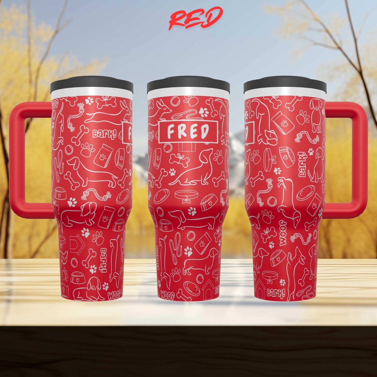 Three red travel mugs with a pattern of dog-related icons and the name "FRED" printed on them.