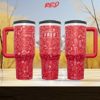 Three red travel mugs with a pattern of dog-related icons and the name "FRED" printed on them.