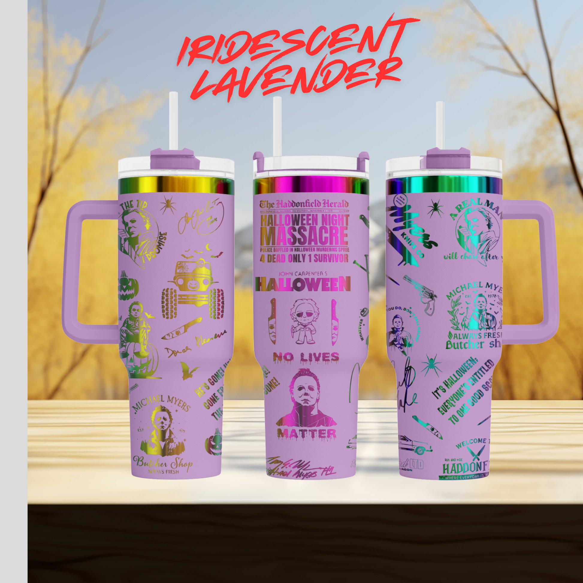 a set of three travel mugs sitting on top of a table