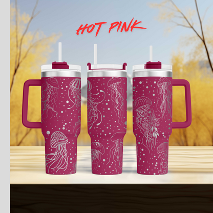 three pink coffee mugs sitting on top of a wooden table