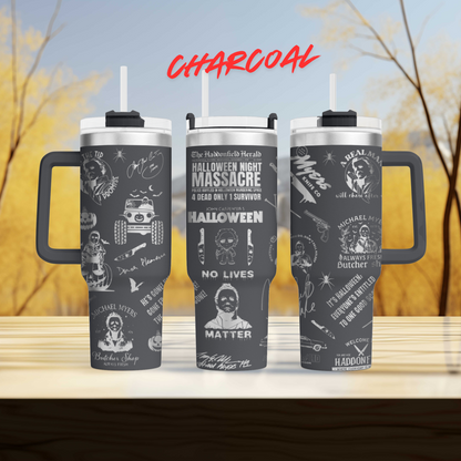 three travel mugs sitting on top of a wooden table