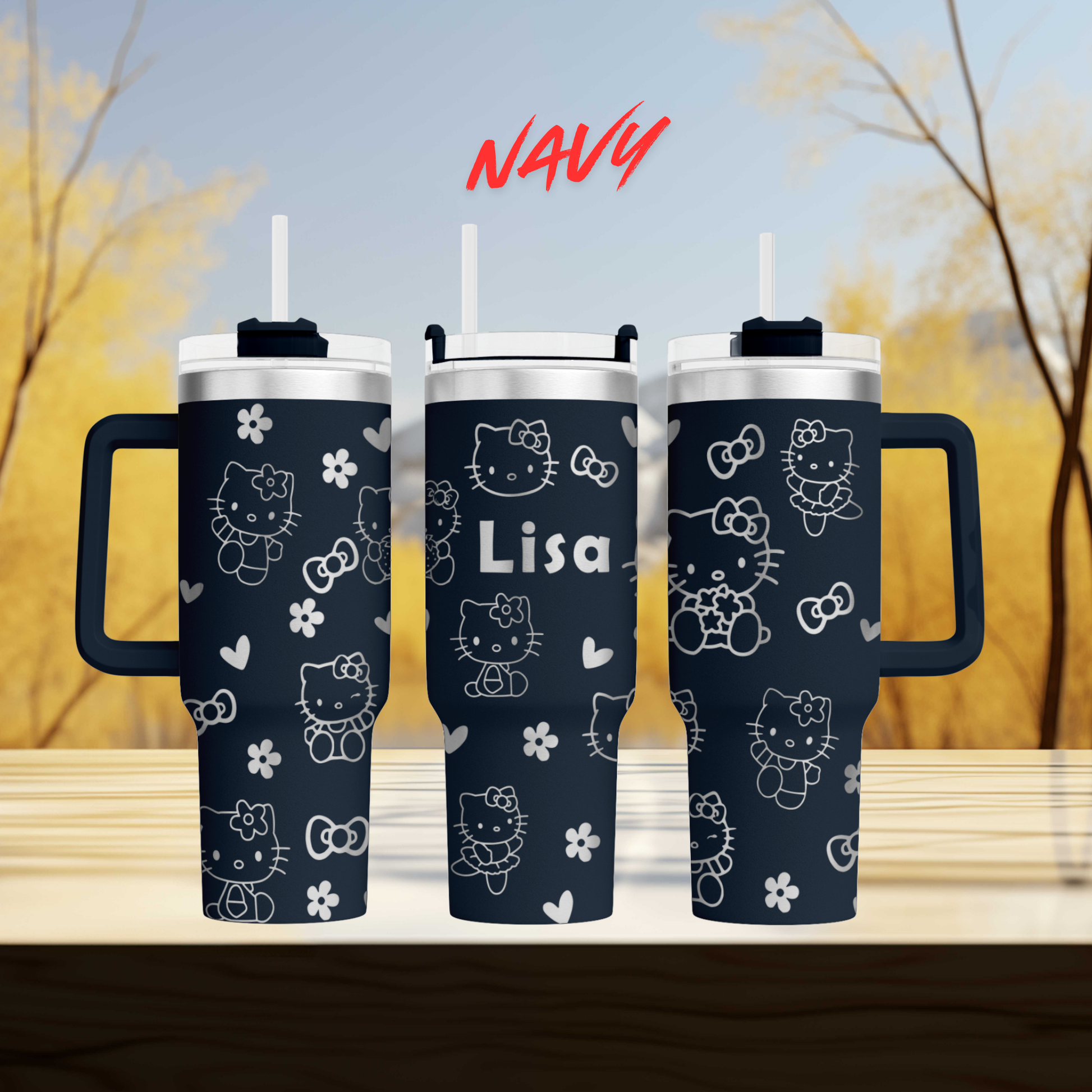three Hello Kitty tumblers with personalized names on them.