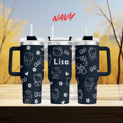 three Hello Kitty tumblers with personalized names on them.