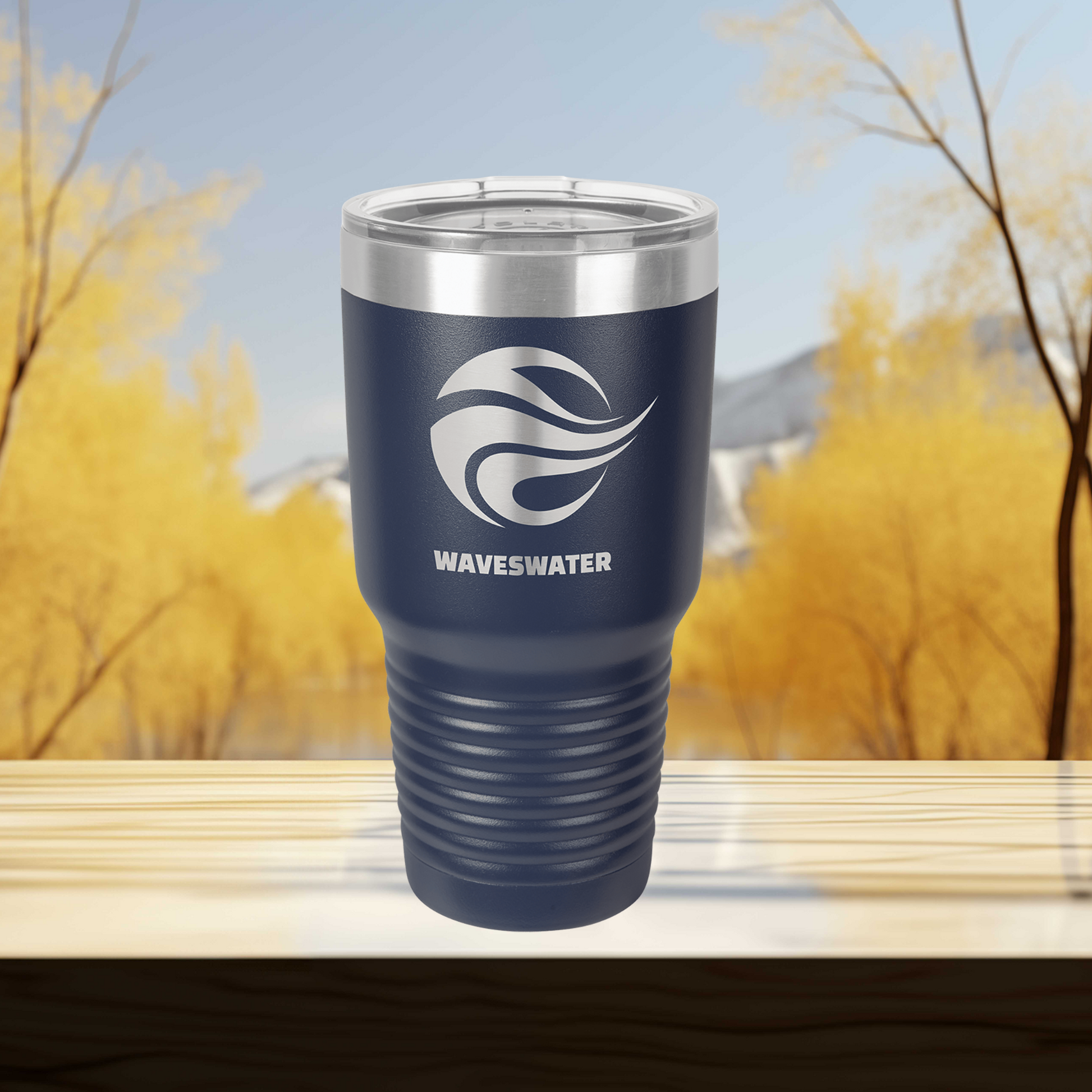 a tumbler cup sitting on top of a wooden table