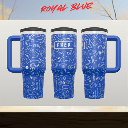 A 3D rendering of a blue thermos mug with a pattern of dog-related icons and the name "Fred" printed on it.